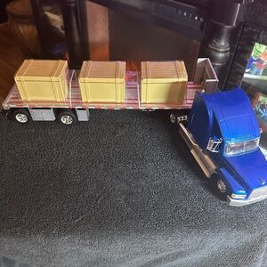 Blue and Silver Toy Truck with Trailer